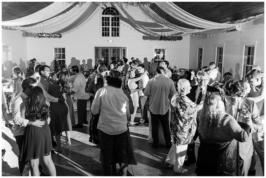 wedding reception dancing charlotte wedding photographer rustic outdoor barn venue evan daniels photography